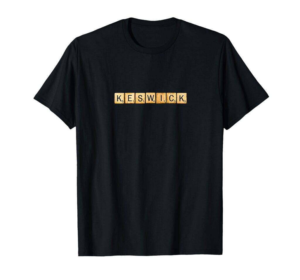 Black Keswick t-shirt featuring the town name spelled out in vintage wooden letter tiles.